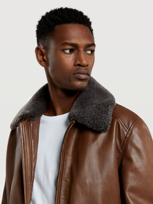 Leather aviator jacket with detachable recycled fur – Sacoor Brothers